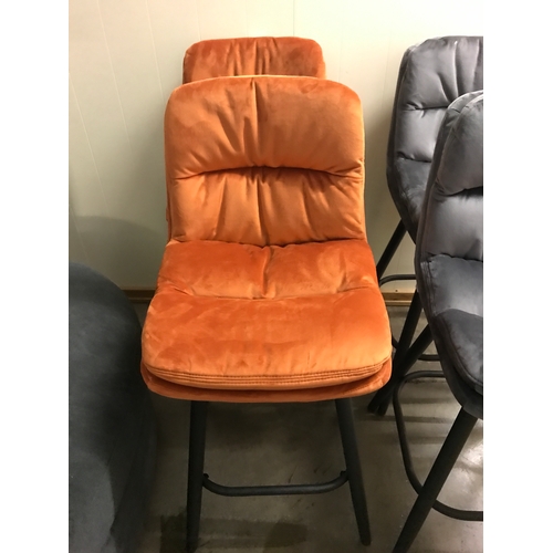 1374 - A pair of Enderson orange velvet bar stools