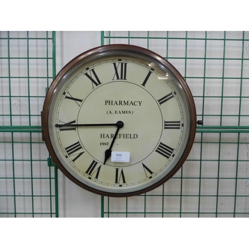 462 - A Victorian style mahogany circular wall clock, the dial signed; Pharmacy (A. Eames), Harefield, 198... 