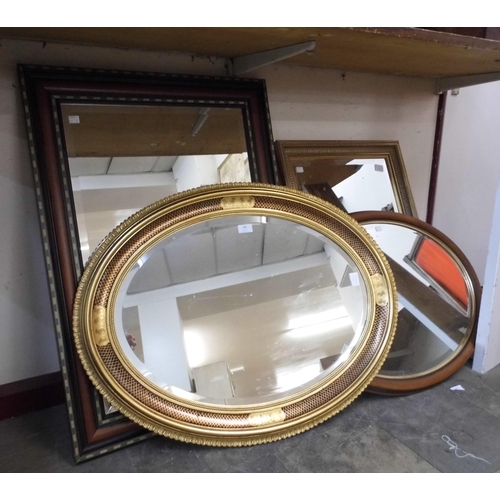 485 - Two gilt framed mirrors and two walnut and parcel gilt framed mirrors