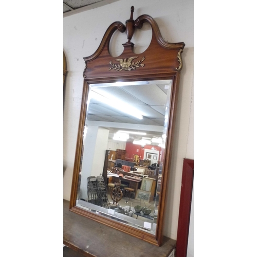 497 - A French Empire style walnut and parcel gilt framed mirror