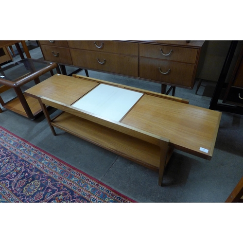 103 - A Remploy teak extending coffee table