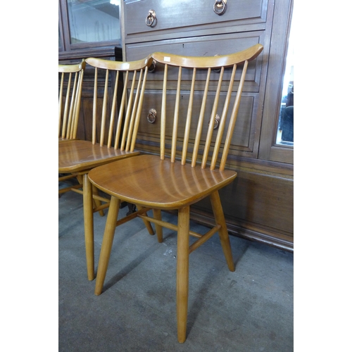 118 - A set of four beech kitchen chairs