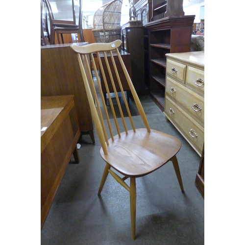 120 - A set of four Ercol Blonde elm and beech Goldsmith chairs