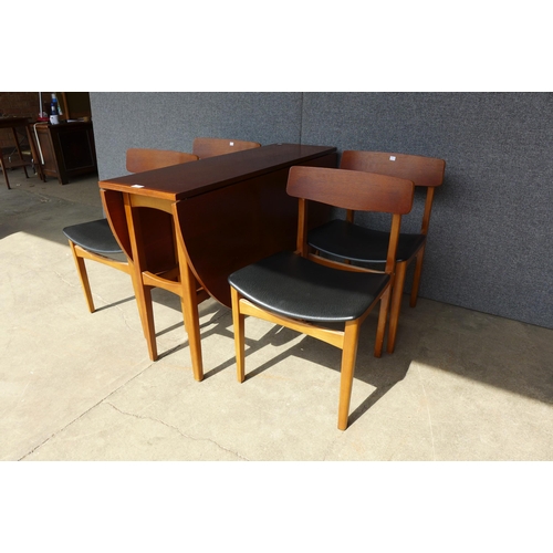 121 - A teak drop-leaf dining table and four chairs