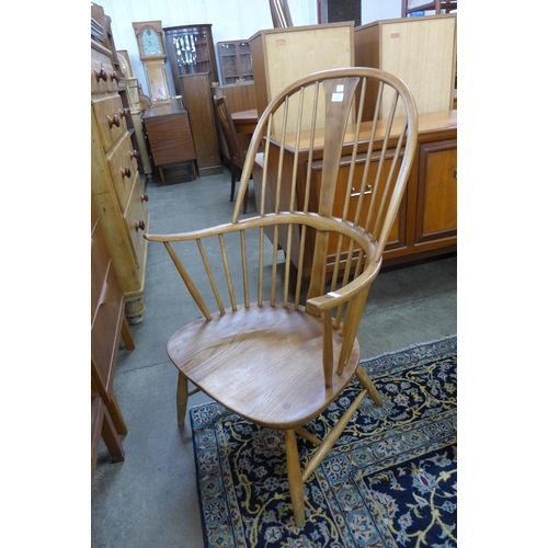 132 - An Ercol elm and beech Chairmakers chair