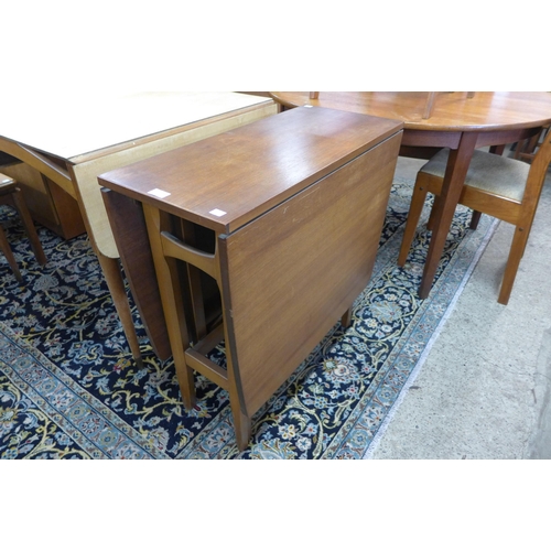 139 - A teak drop-leaf table