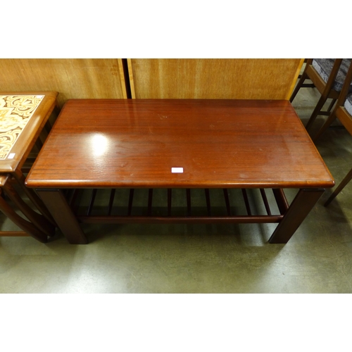 142 - A simulated rosewood coffee table