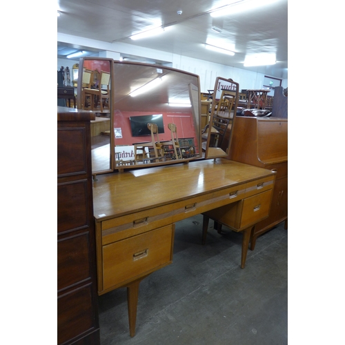 144 - A teak dressing table