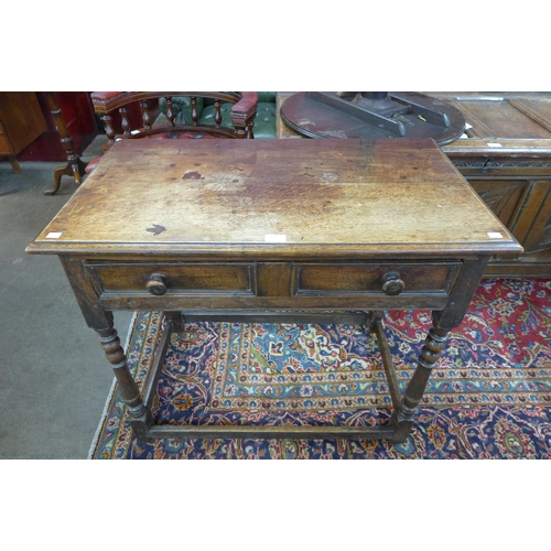 155 - A William III oak single drawer side table