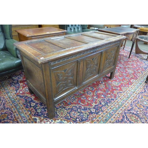 157 - A William III carved oak panelled coffer