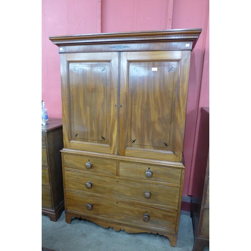 161 - A Regency inlaid mahogany linen press, w 113cm, d 51cm, h 173cm