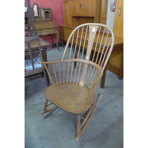 17 - An Ercol Blonde elm and beech Chairmaker's rocking chair