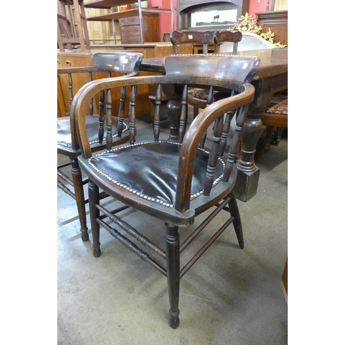 170 - A pair of Victorian elm and beech Captain's desk chairs