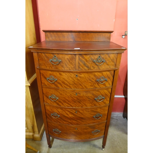 175 - An Edward VII mahogany bow front chest of drawers