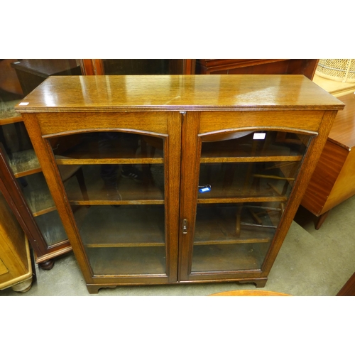 197 - An Edward VII oak two door bookcase