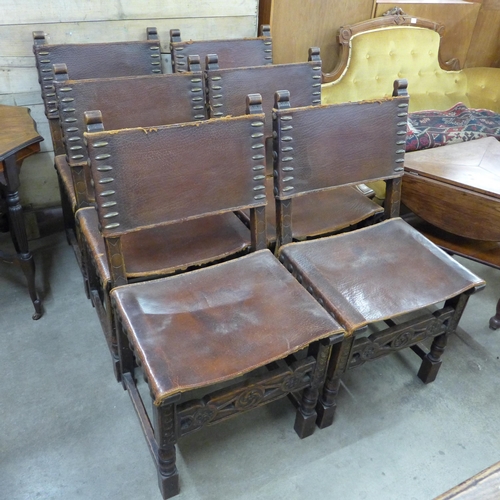 223 - A set of six 17th Century style oak and brown leather dining chairs