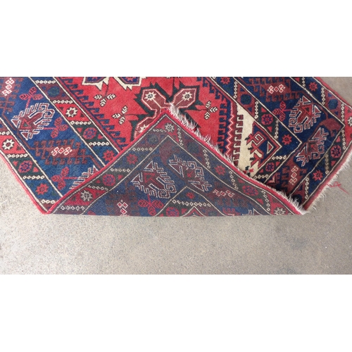 227 - A Turkish red ground rug