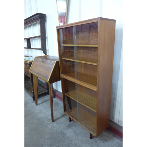 23 - A teak bookcase