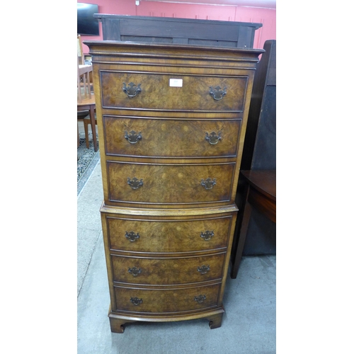 237 - A George I style Reprodux walnut and burr walnut bow front chest on chest