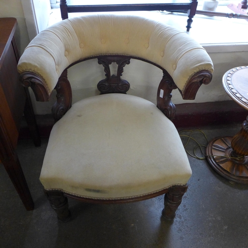 259 - A William IV carved mahogany and fabric upholstered library chair