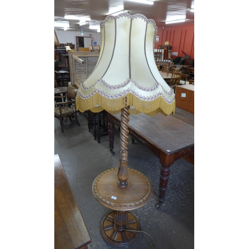 260 - A French carved beech barleytwist standard lamp