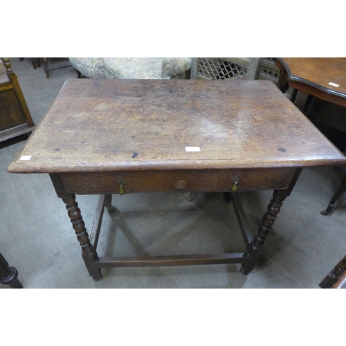 284 - A William III oak single drawer side table