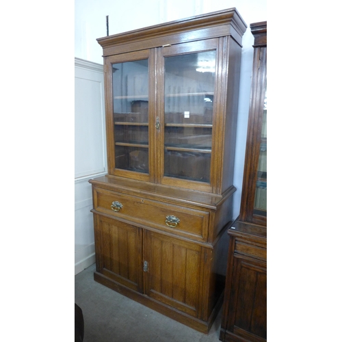 291 - A Victorian oak secretaire bookcase