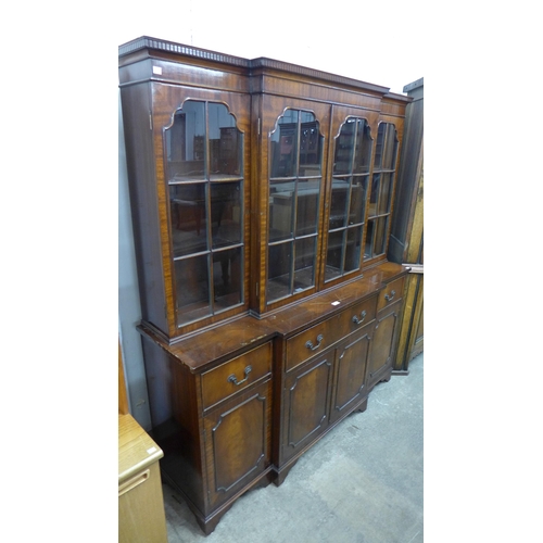 296 - A Regency style mahogany breakfront secretaire bookcase