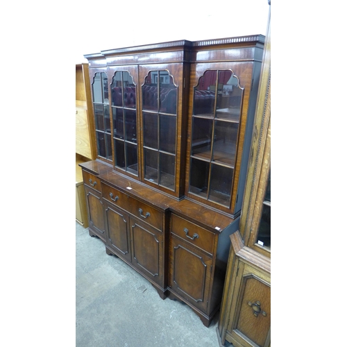 296 - A Regency style mahogany breakfront secretaire bookcase