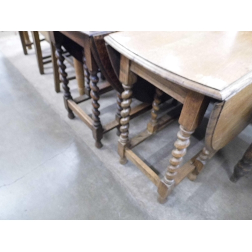 308 - Two oak barleytwist gateleg tables