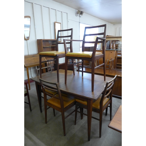 32 - A Fyne Ladye afromosia extending dining table and six chairs, designed by Richard Hornby