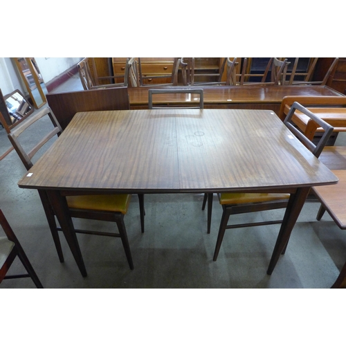 32 - A Fyne Ladye afromosia extending dining table and six chairs, designed by Richard Hornby