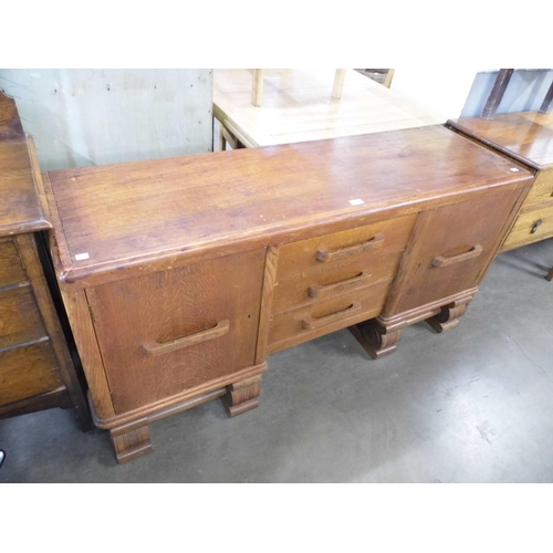 323 - An Art Deco oak sideboard