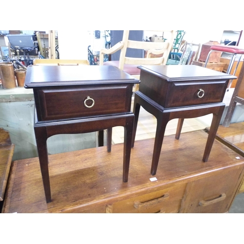 327 - A pair of Stag Minstrel mahogany bedside tables