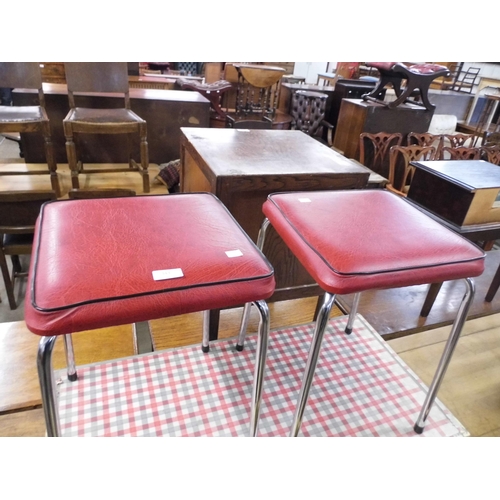 343 - A pair of chrome and red vinyl kitchen stools