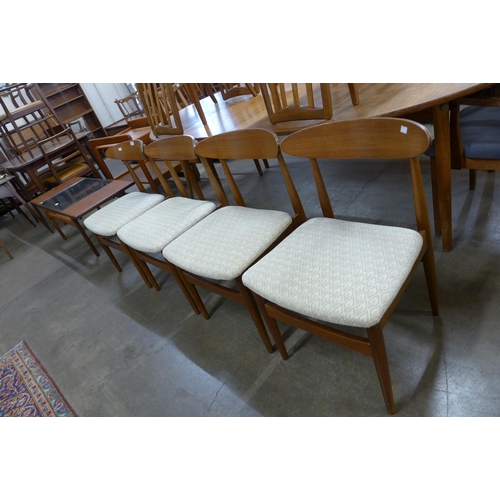 36 - A set of four teak dining chairs