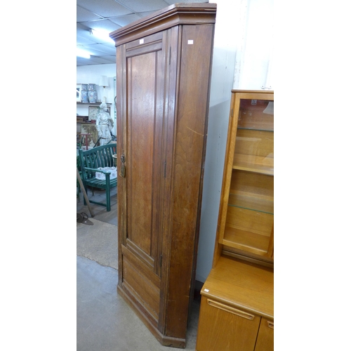 362 - A Victorian ash freestanding corner cupboard