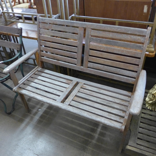 364 - Two teak garden benches