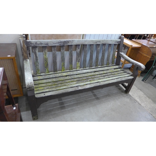 369 - A teak garden bench