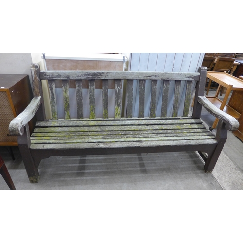 369 - A teak garden bench