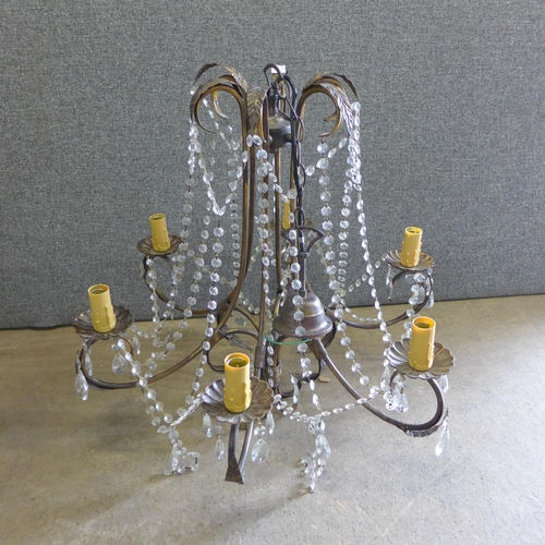 393 - An Italian wrought steel chandelier