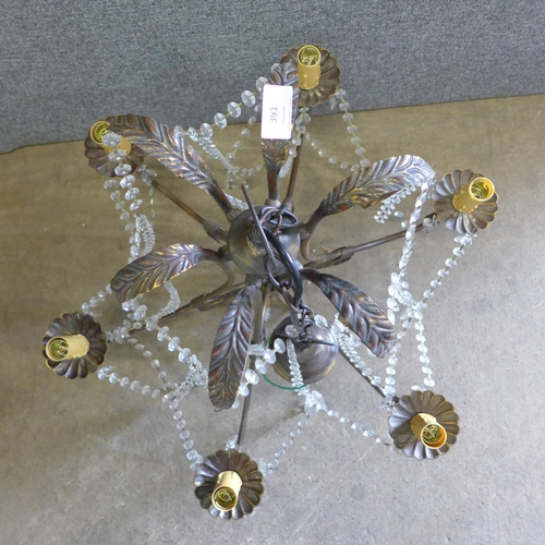 393 - An Italian wrought steel chandelier