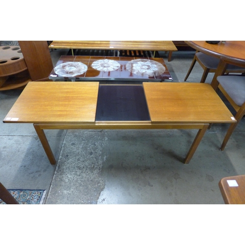 45 - A Remploy teak extending rectangular coffee table