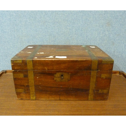 450 - A Victorian walnut and brass mounted lady's jewellery box