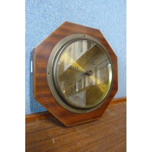 461 - An early 20th Century inlaid mahogany octagonal aneroid barometer, the brass dial signed James Lucki... 