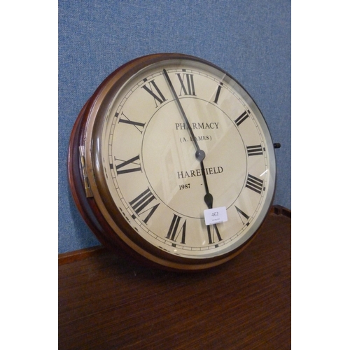 462 - A Victorian style mahogany circular wall clock, the dial signed; Pharmacy (A. Eames), Harefield, 198... 