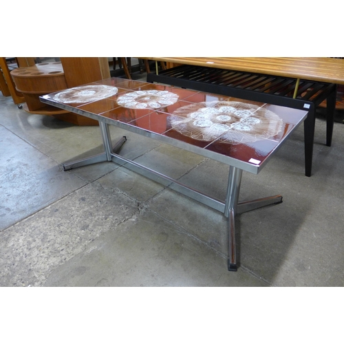 47 - A chrome and tiled topped rectangular coffee table