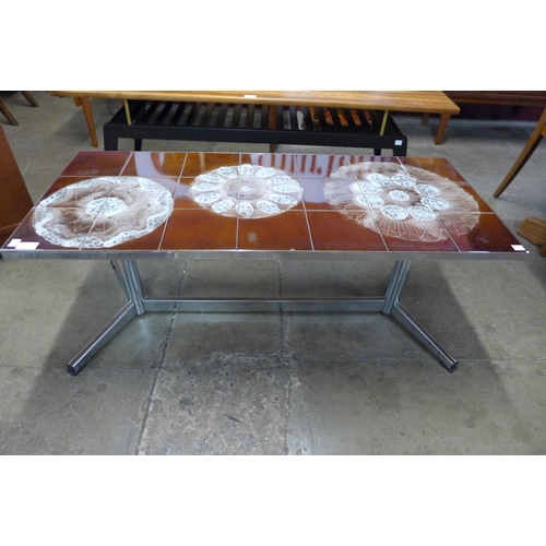 47 - A chrome and tiled topped rectangular coffee table