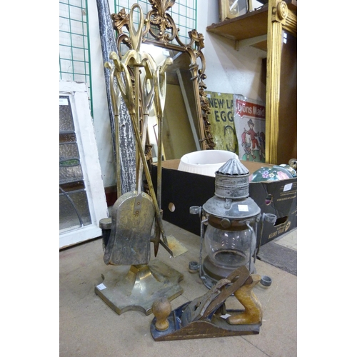 476 - A galvanised lantern, companion set and woodworking plane