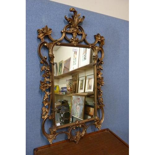 478 - A Rococo style gilt framed mirror